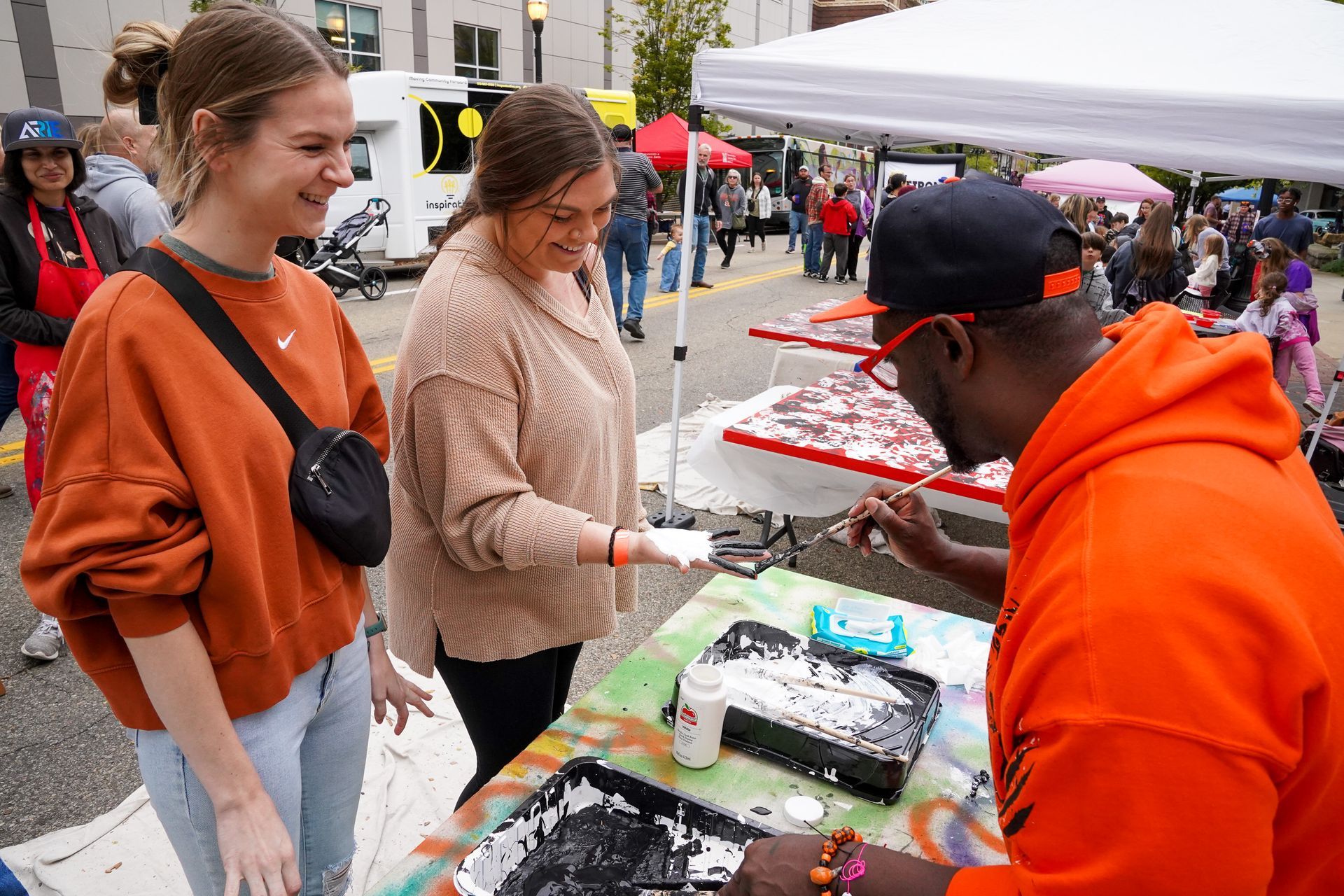 group of people smiling and talking