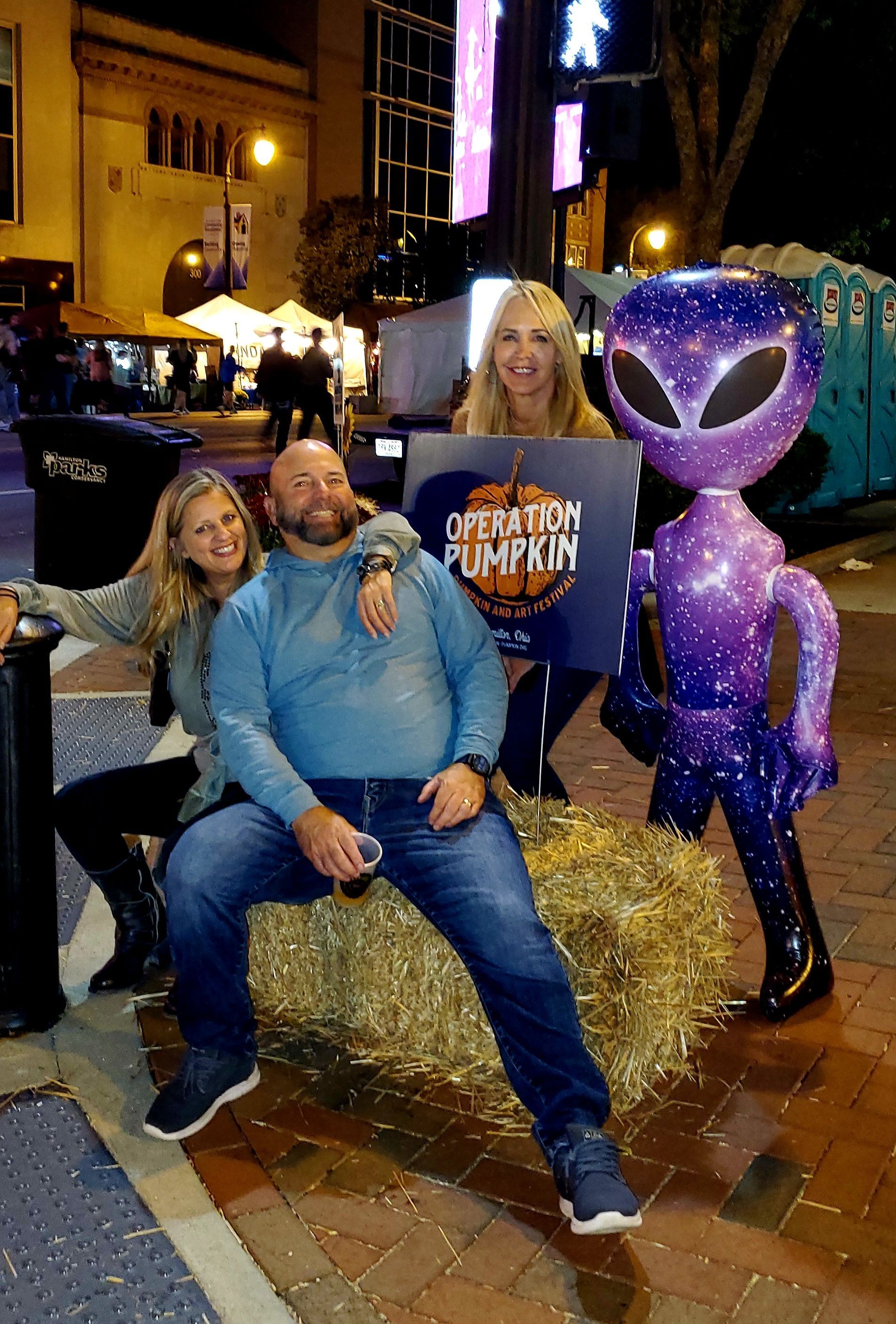 man in blue shirt standing