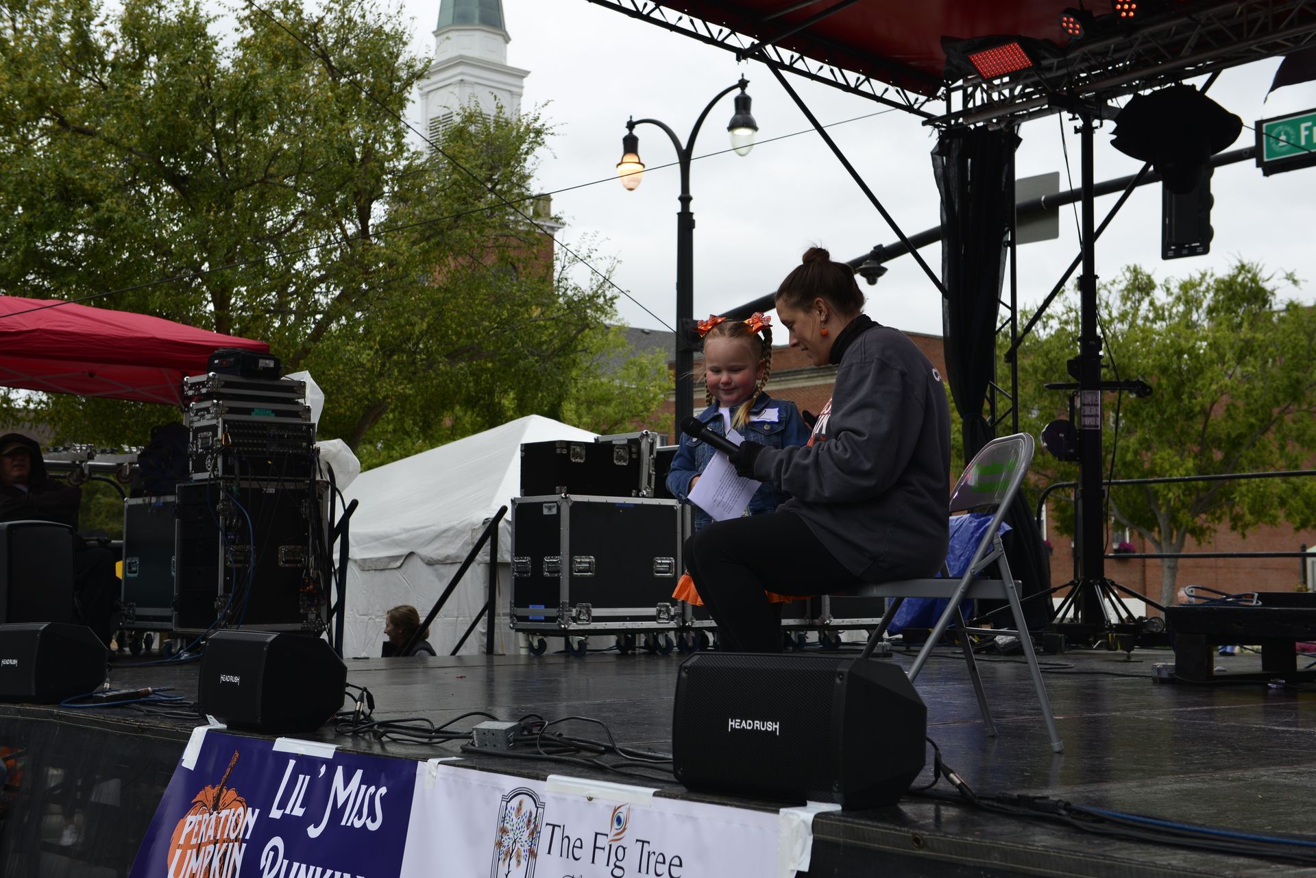 woman interviewing a kid