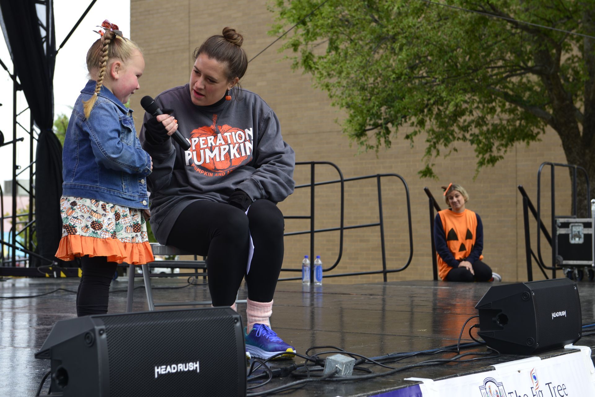 woman interviewing a kid