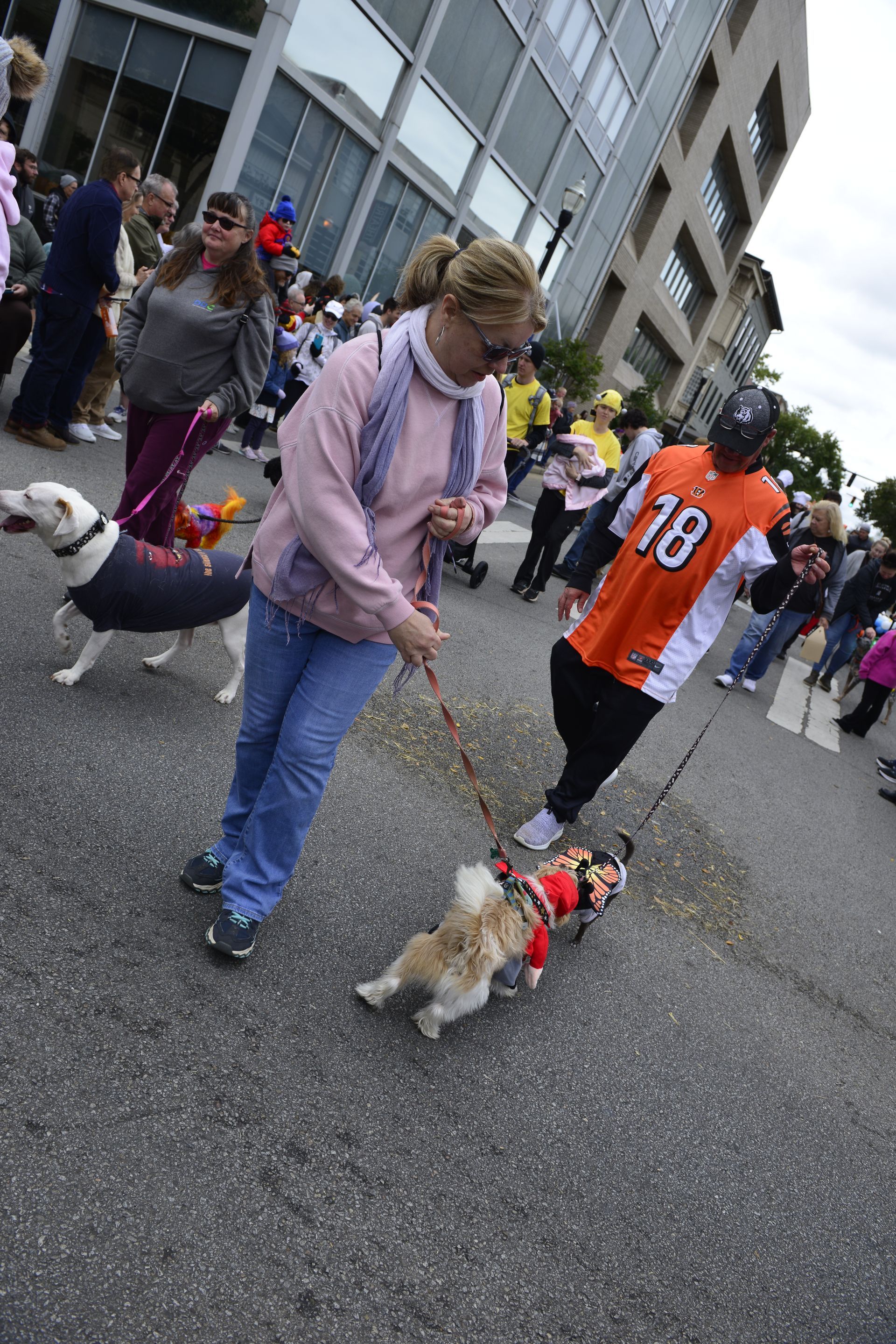 a man wearing an orange jersey with the number 18 on it