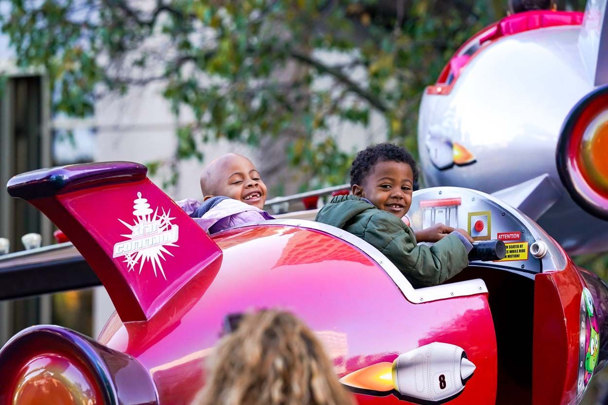 Boys enjoying planed ride