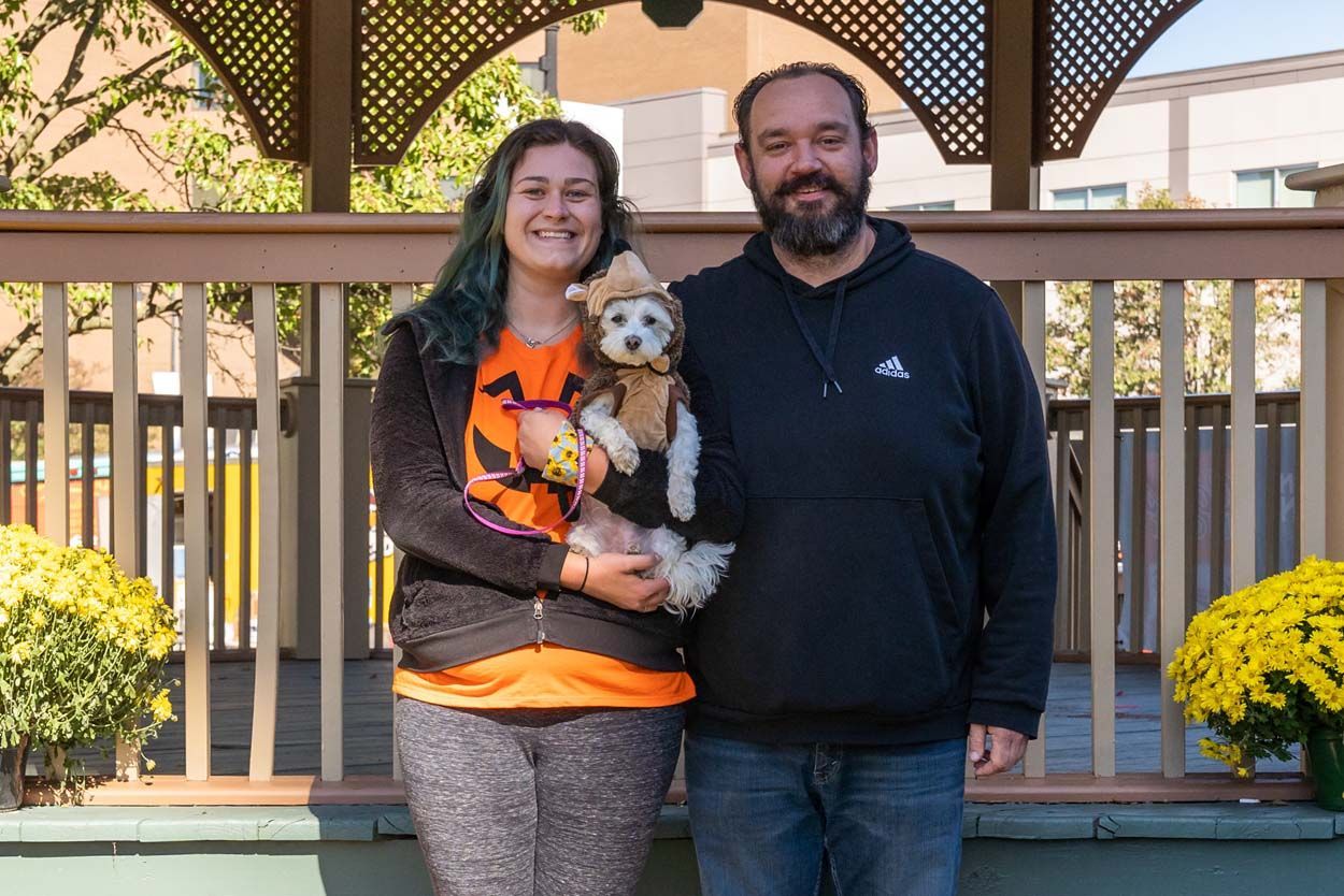 Couple with small dog