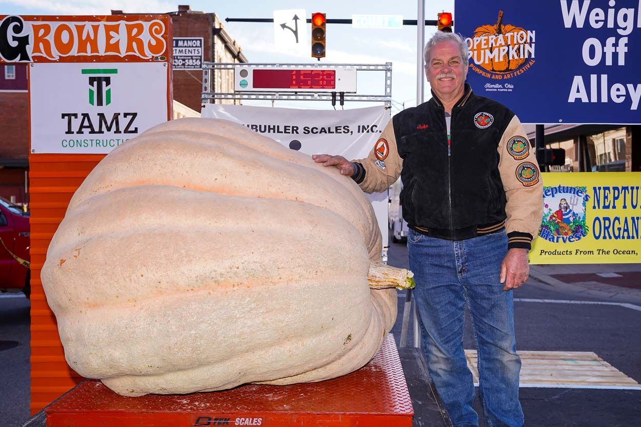 Man beide the pumpkin