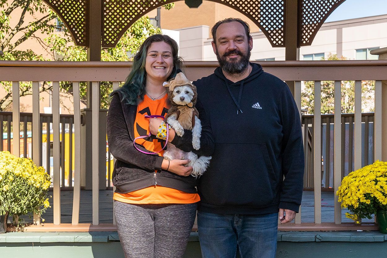 Couple with small dog