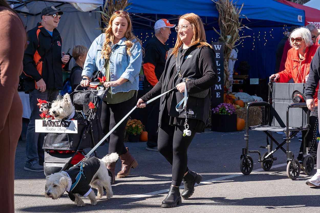 Girls on parade with their dogs
