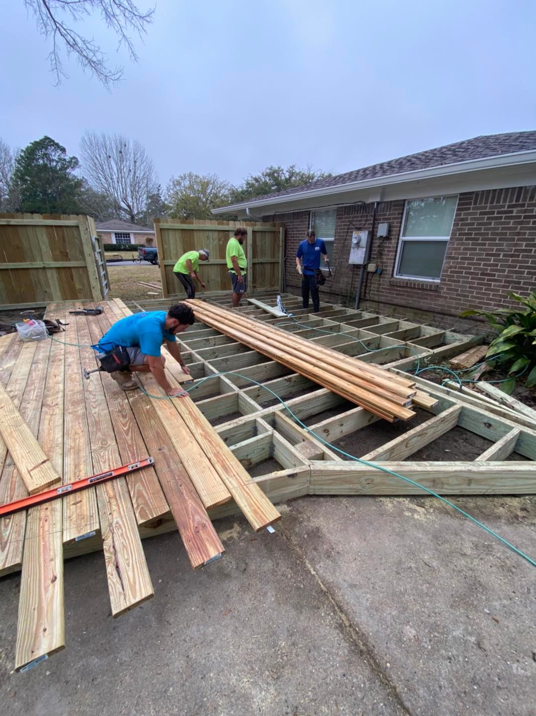 dunkin fence and deck on the job