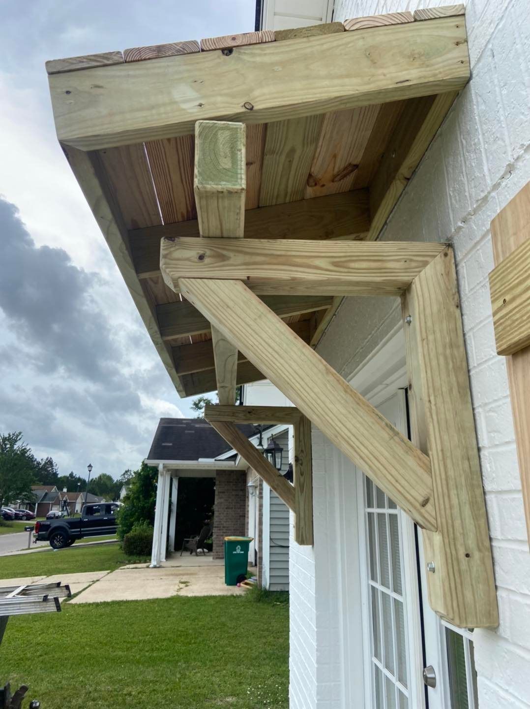 building with wood awning