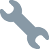 A light blue, flat icon of a double-ended open-jaw wrench oriented diagonally.
