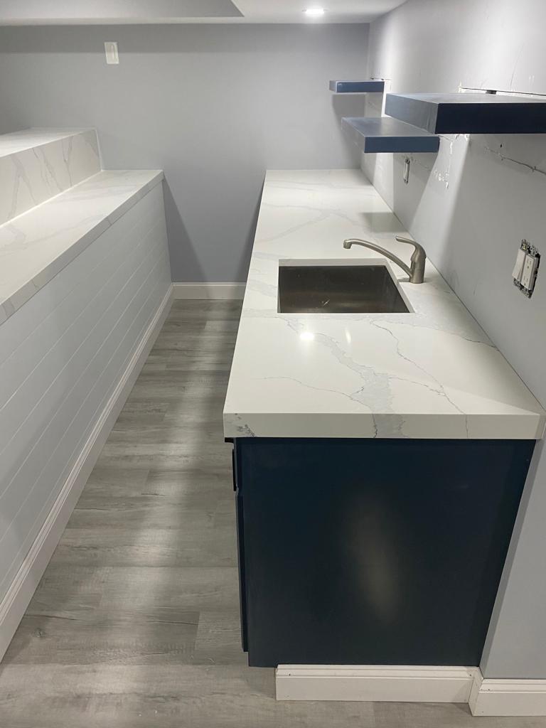White quartz countertop with sink