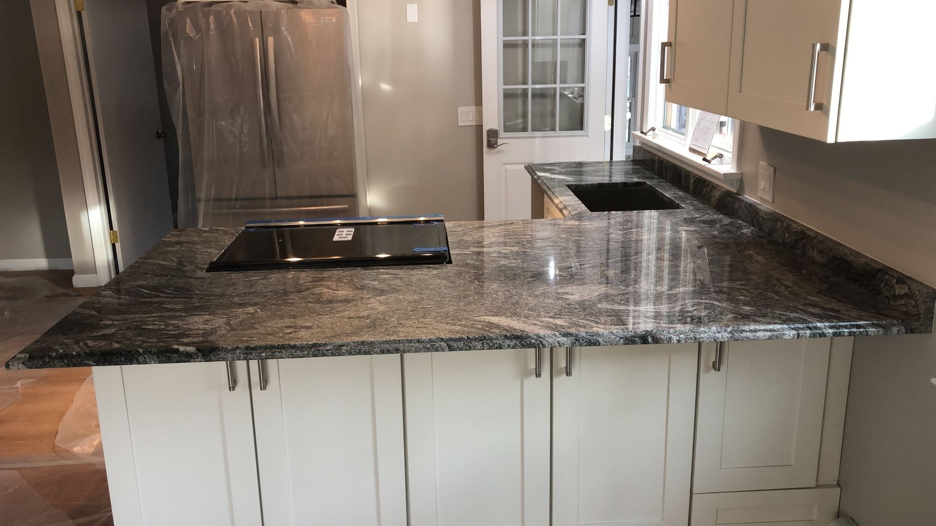 Dark gray granite kitchen countertop
