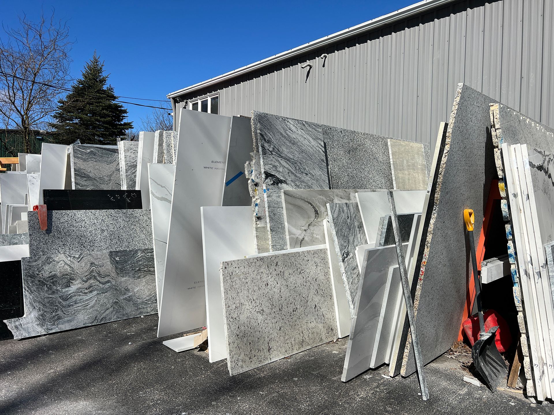 Remnant granite slabs in front of a building