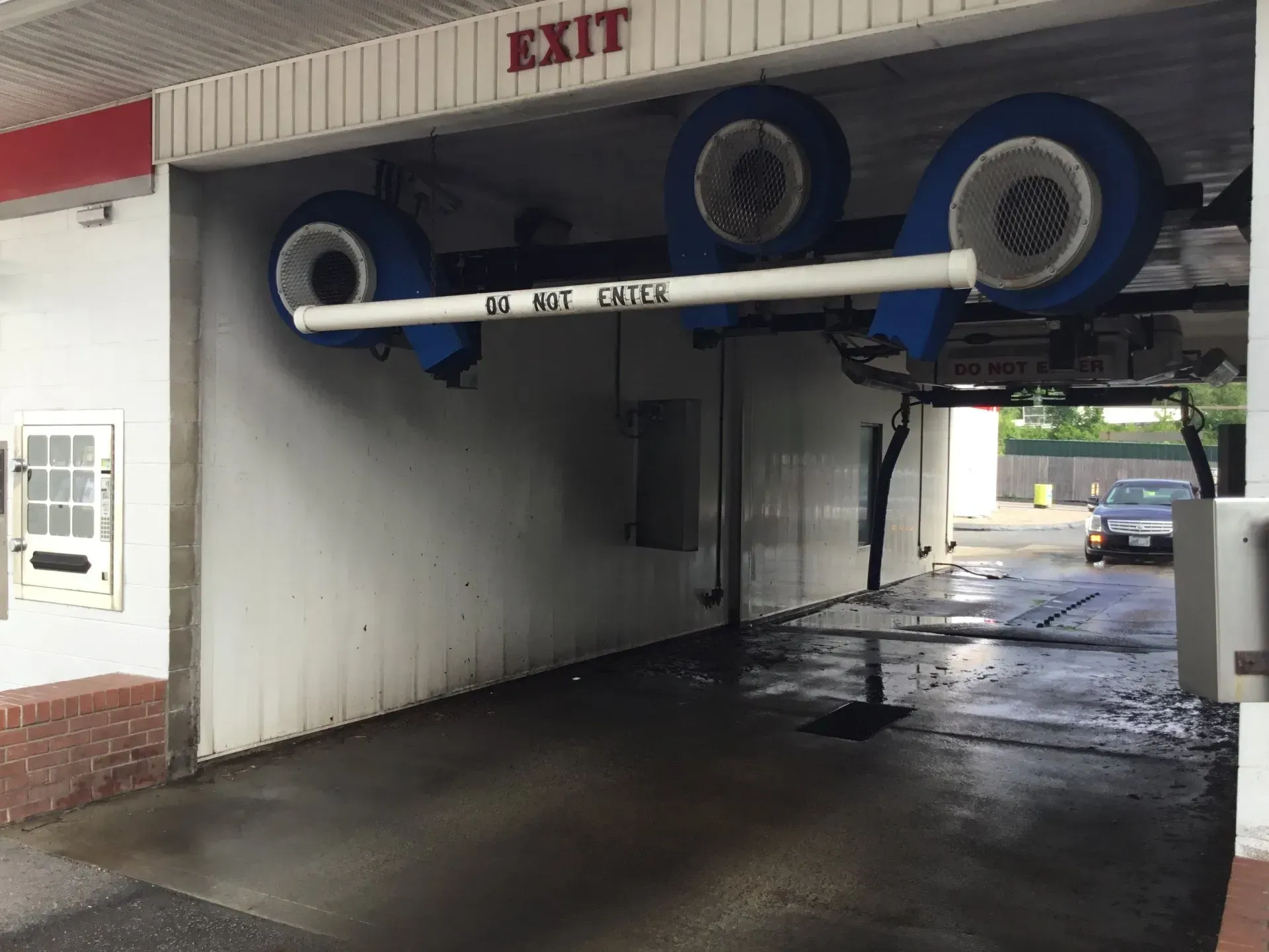 A car wash with a sign that says exit