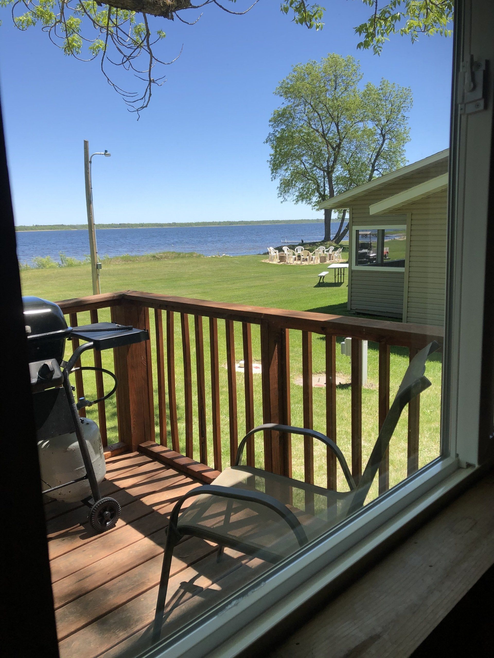 Wooden cabin deck overlooking the lake