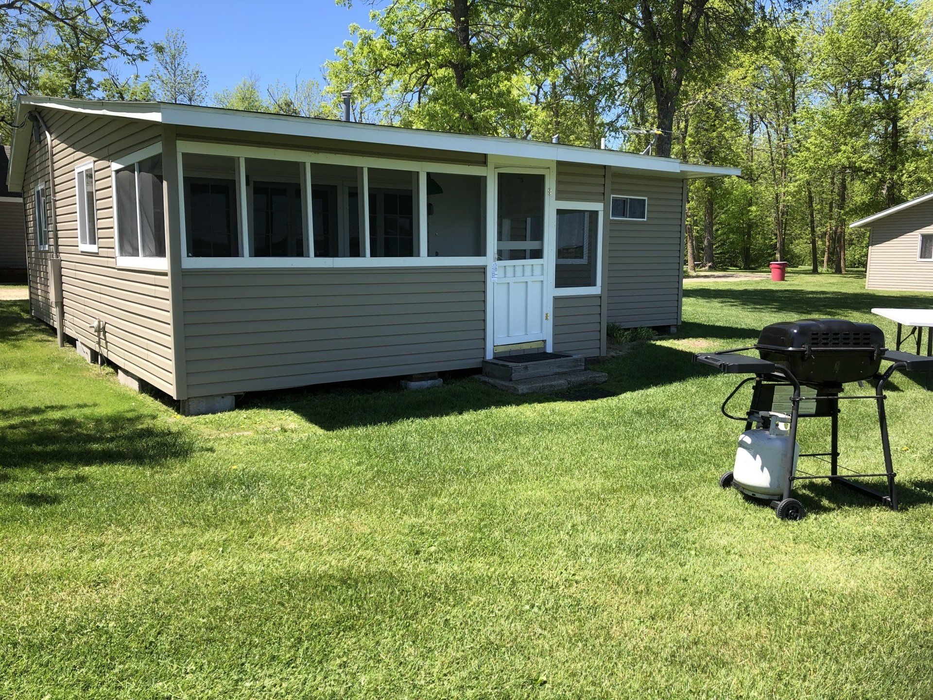 Wooden cabin with spacious lawn