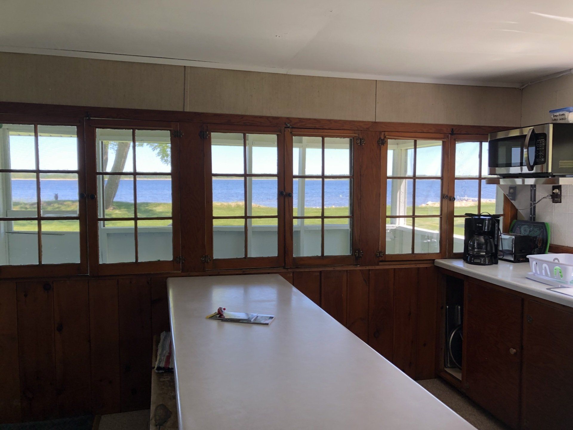 Kitchen table with windows overlooking the lake