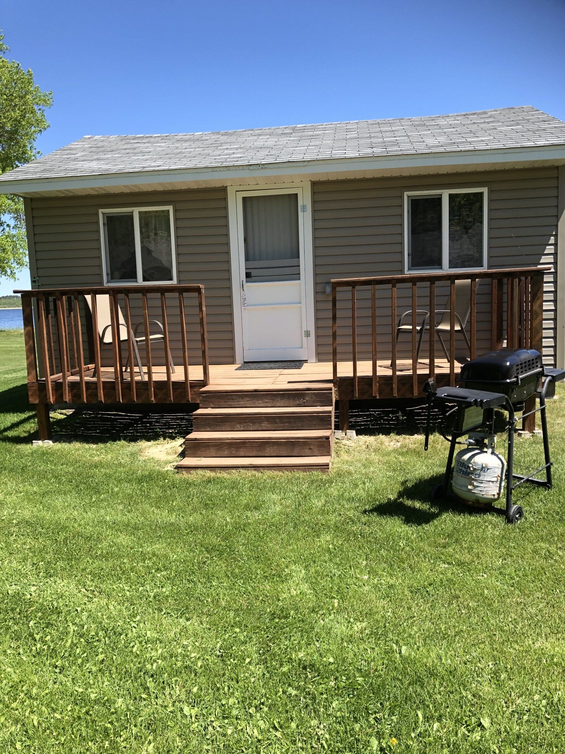 Wooden cabin with spacious lawn