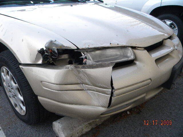 Damage bumper of a white car