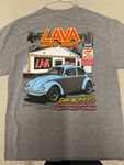 A grey t-shirt featuring a graphic of a light blue Volkswagen Beetle parked in front of a building labeled Lava Auto Body.