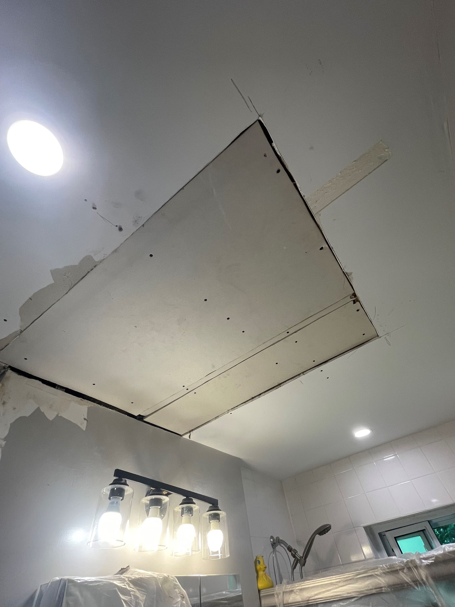 Bathroom ceiling repair renovation in process