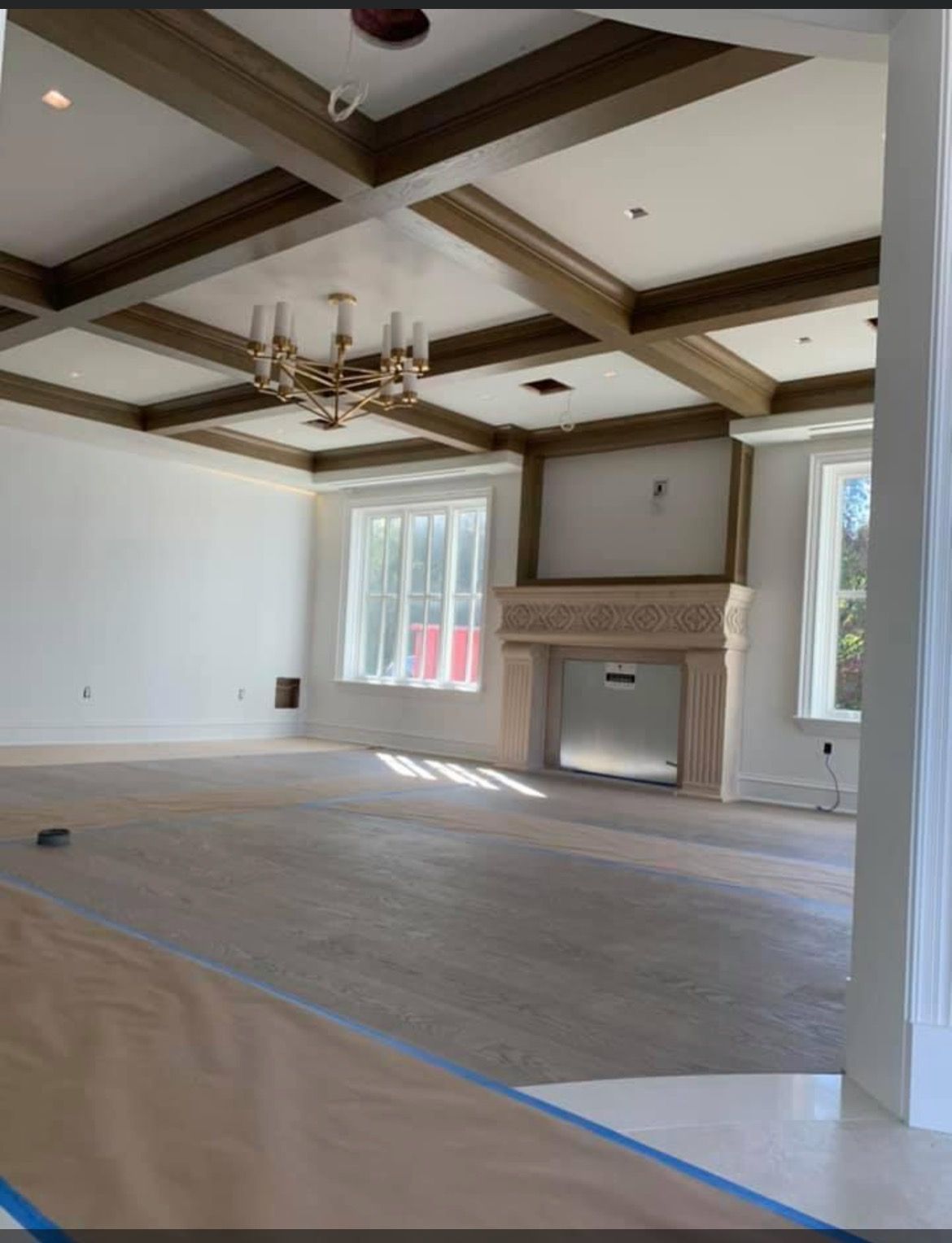 bare living area with fireplace