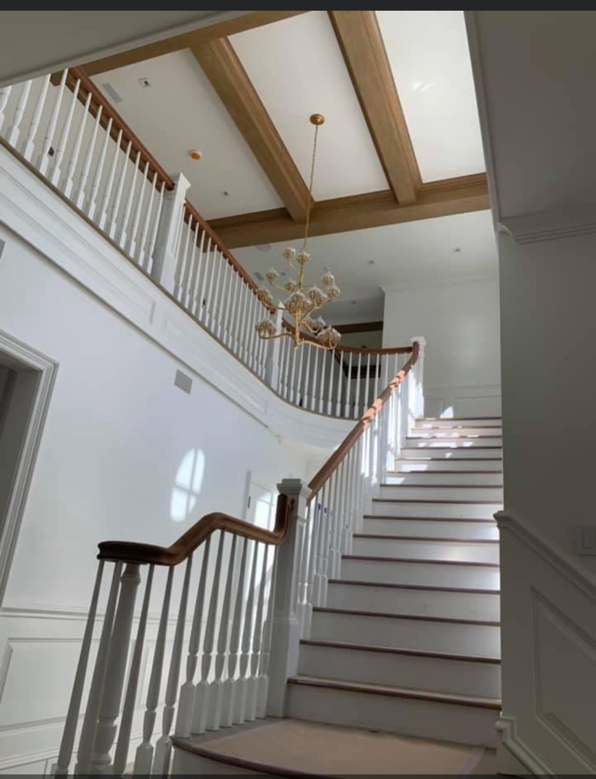 huge staircase with chandelier