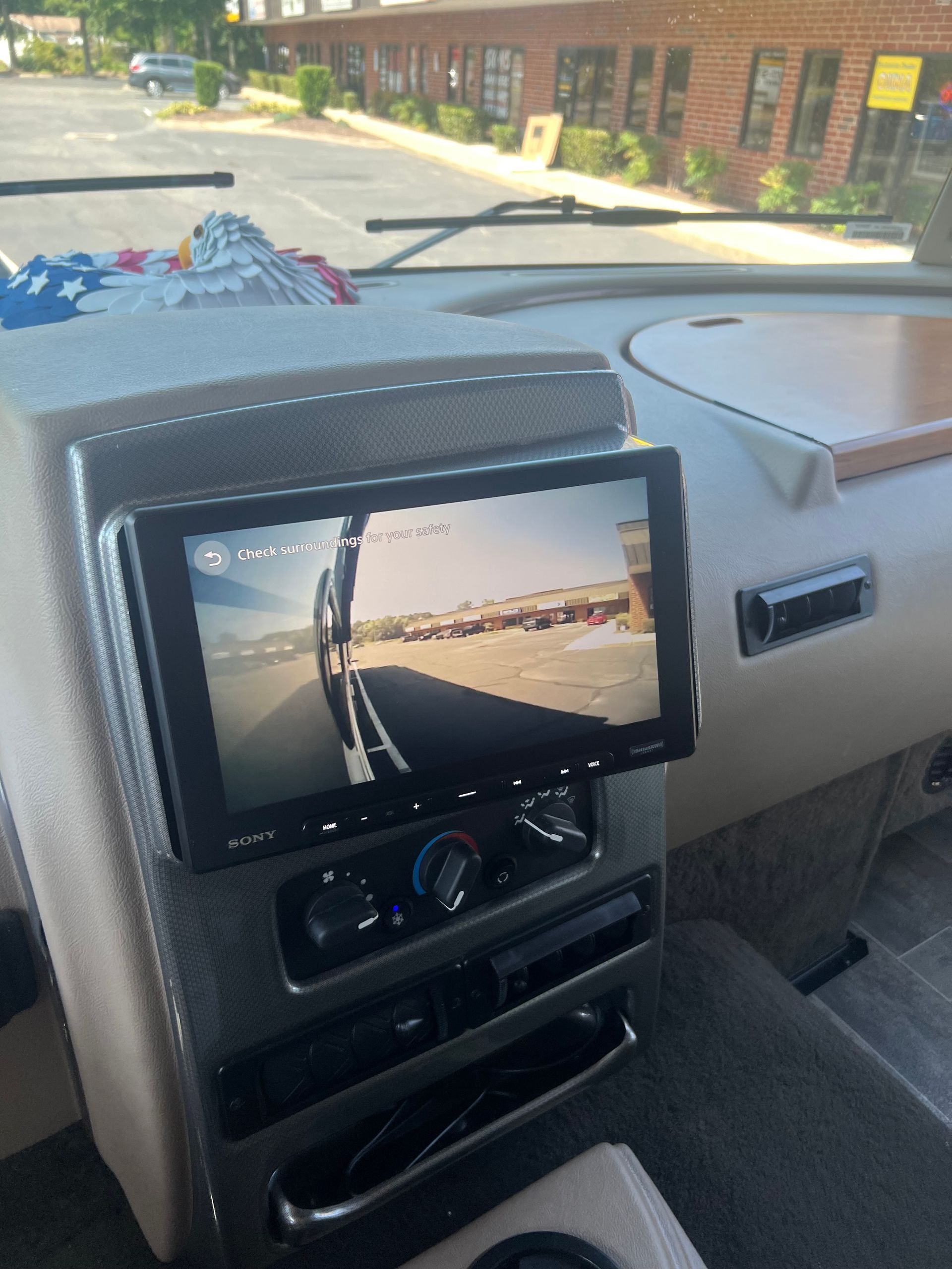 a car dashboard with a rear view camera on it