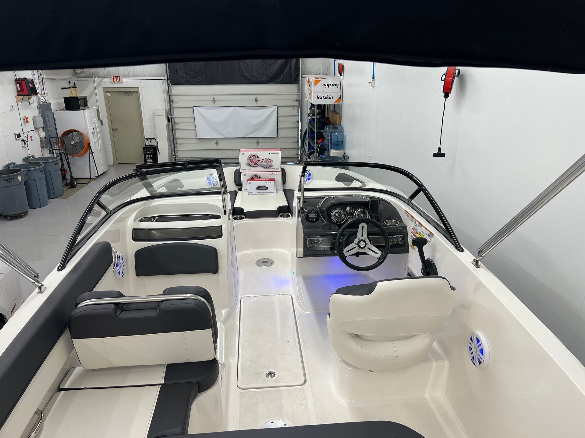 the inside of a boat is shown in a garage