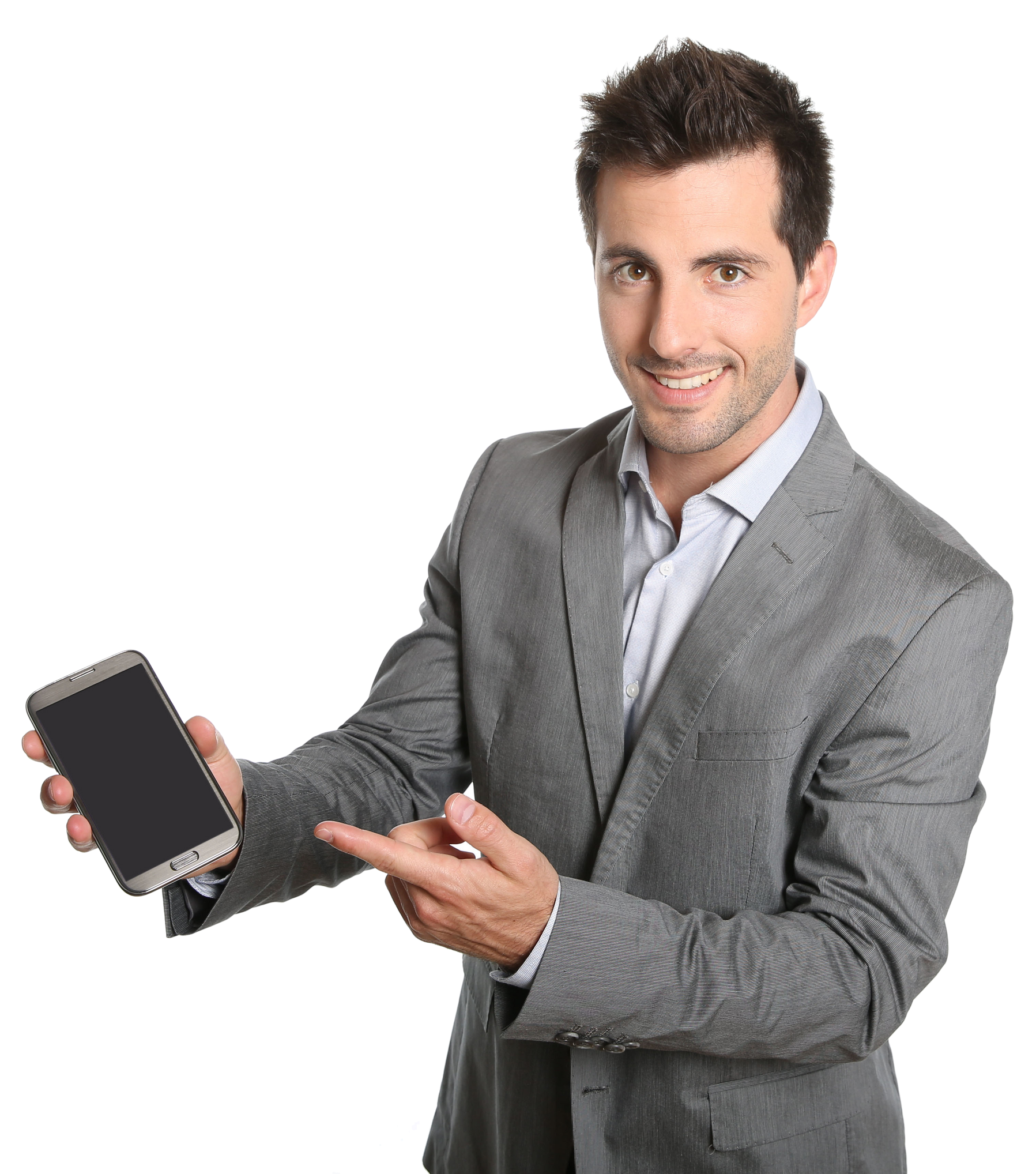 a man in a suit is holding a cell phone and pointing at it