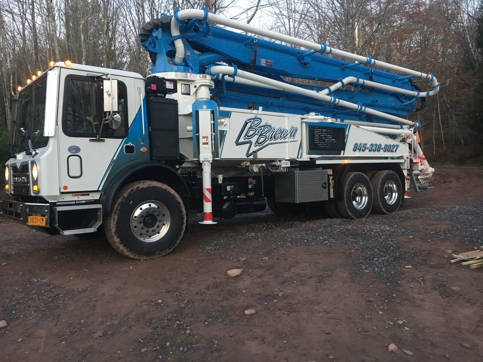 Driver side view of pump truck