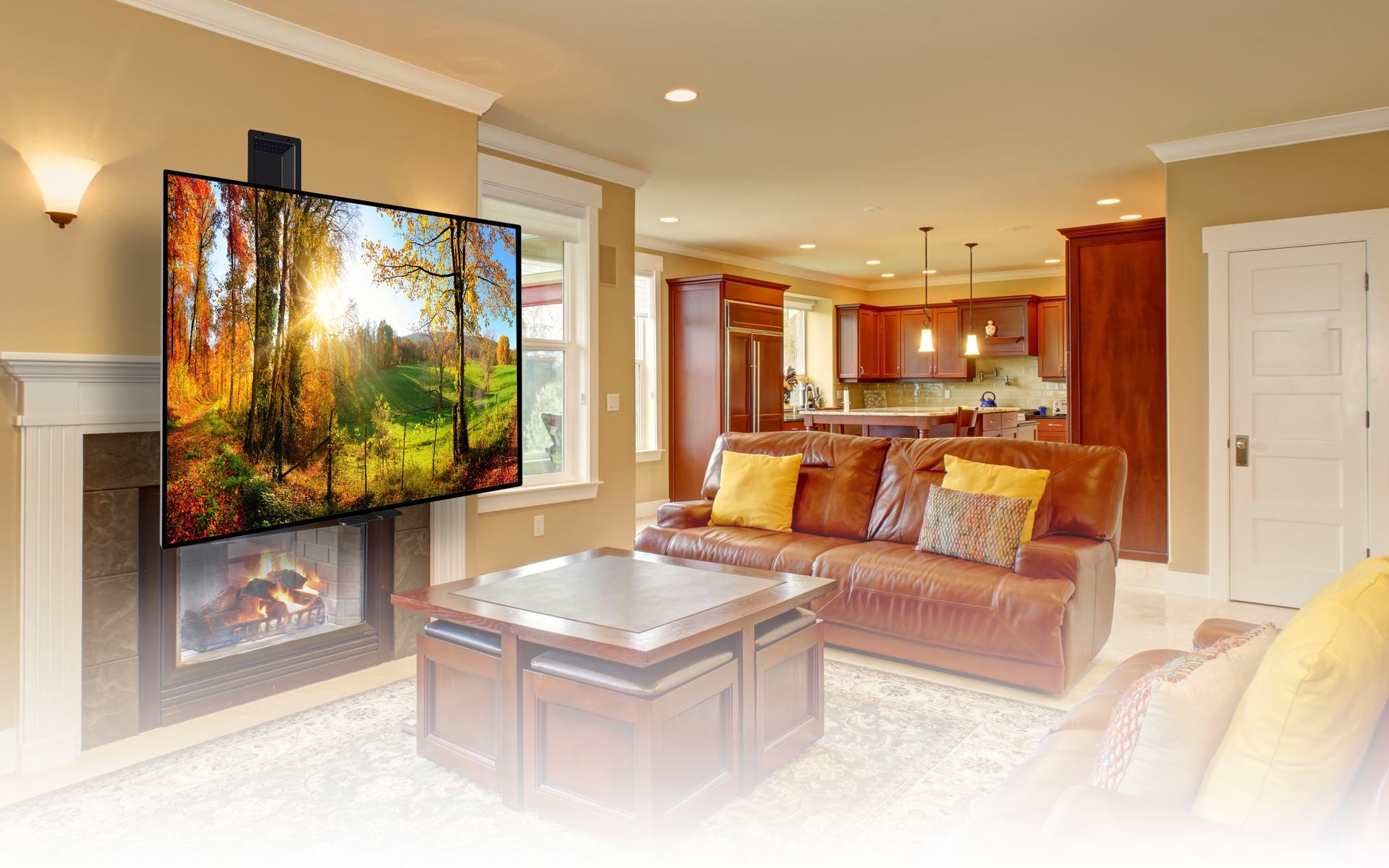 Living room with TV over fireplace, brown leather sofa, open to kitchen, warm tones.