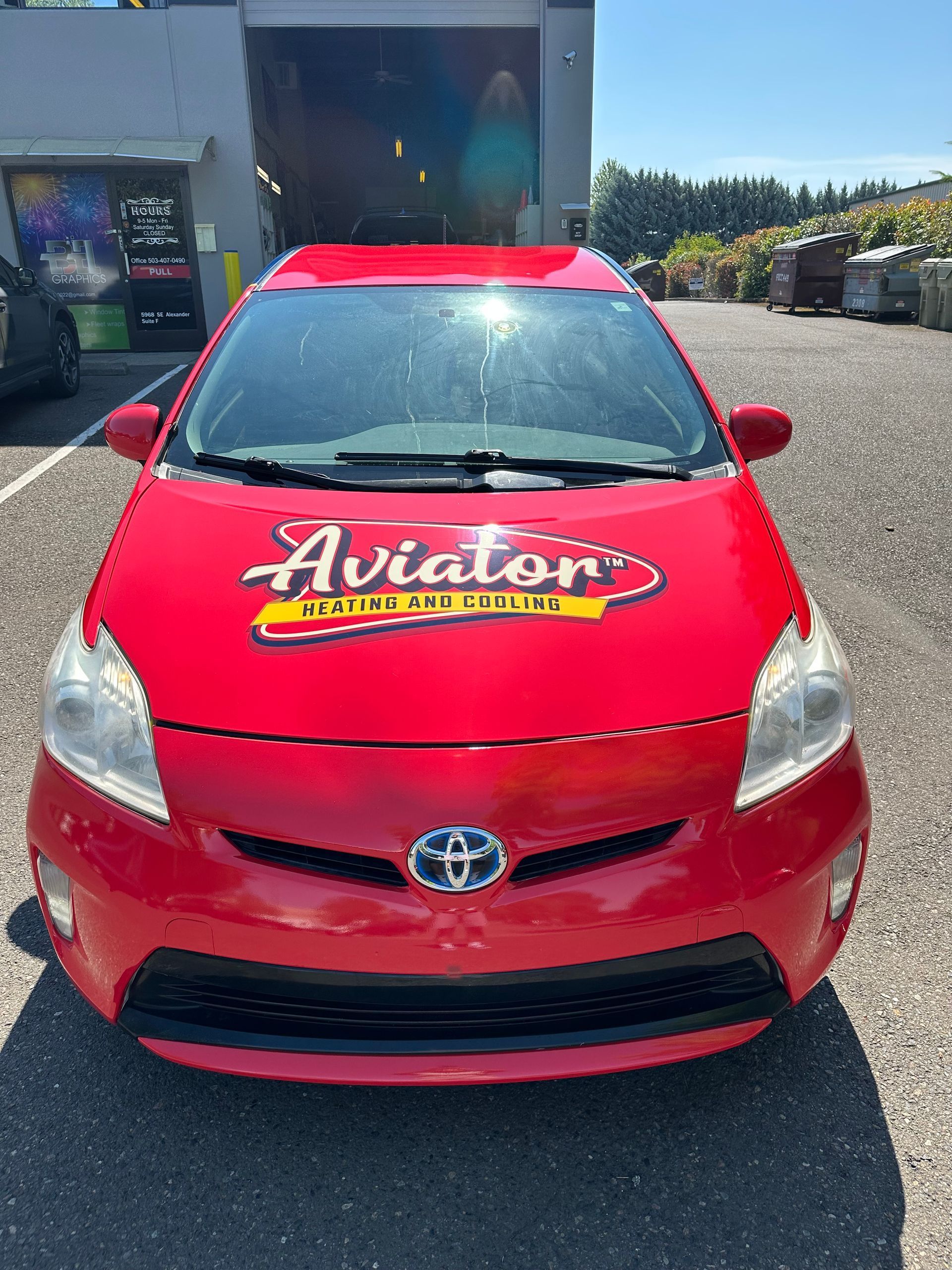 Red Toyota Prius with 