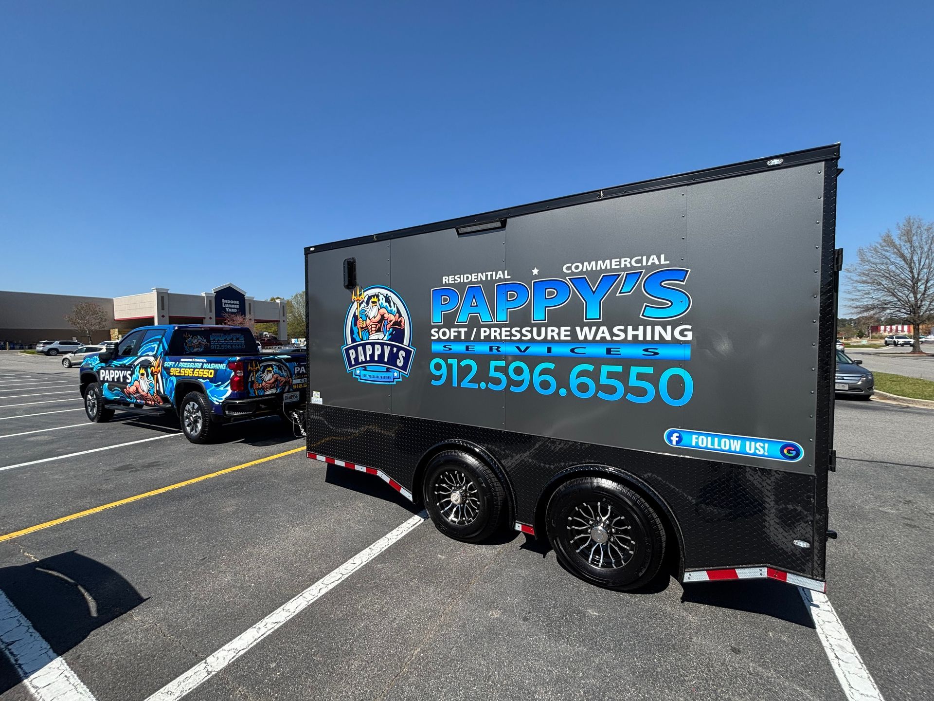 A trailer for Pappy's Soft Pressure Washing is parked in a parking lot