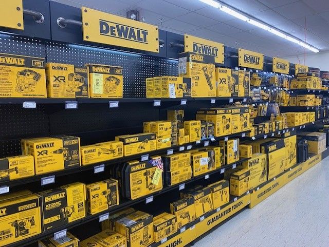 A display of dewalt tools in a store