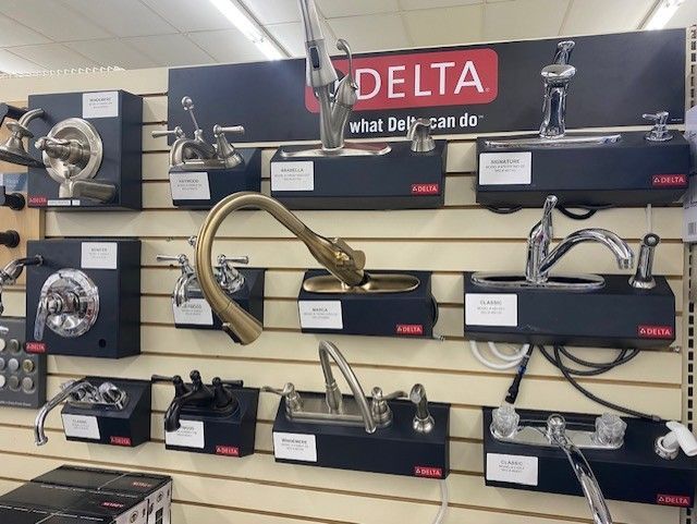 A display of delta faucets in a store