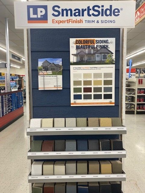 A display of smartside trim and siding in a store