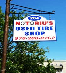 Notoriu's Used Tire Shop signage