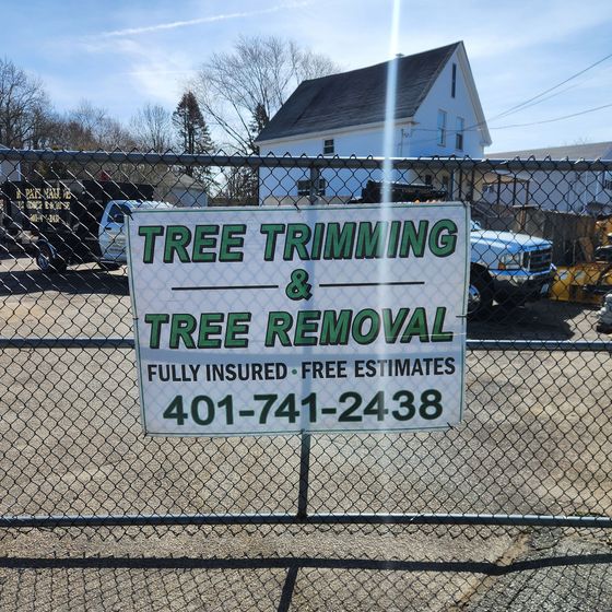 Tree trimming and tree removal sign