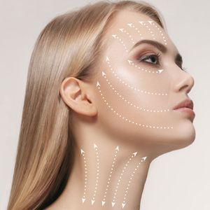A close up of a woman's face after face contouring treatment