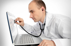 doctor-with-stethoscope & laptop