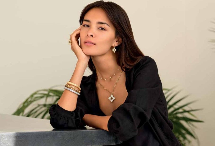 a lady wearing beautiful jewelry