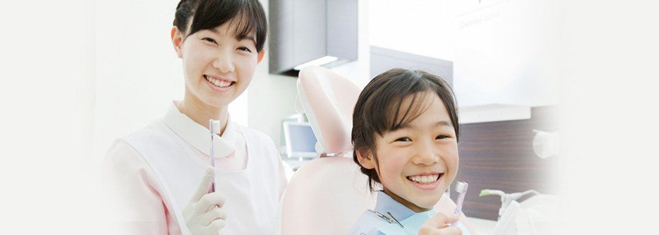 Smiling dentist and patient