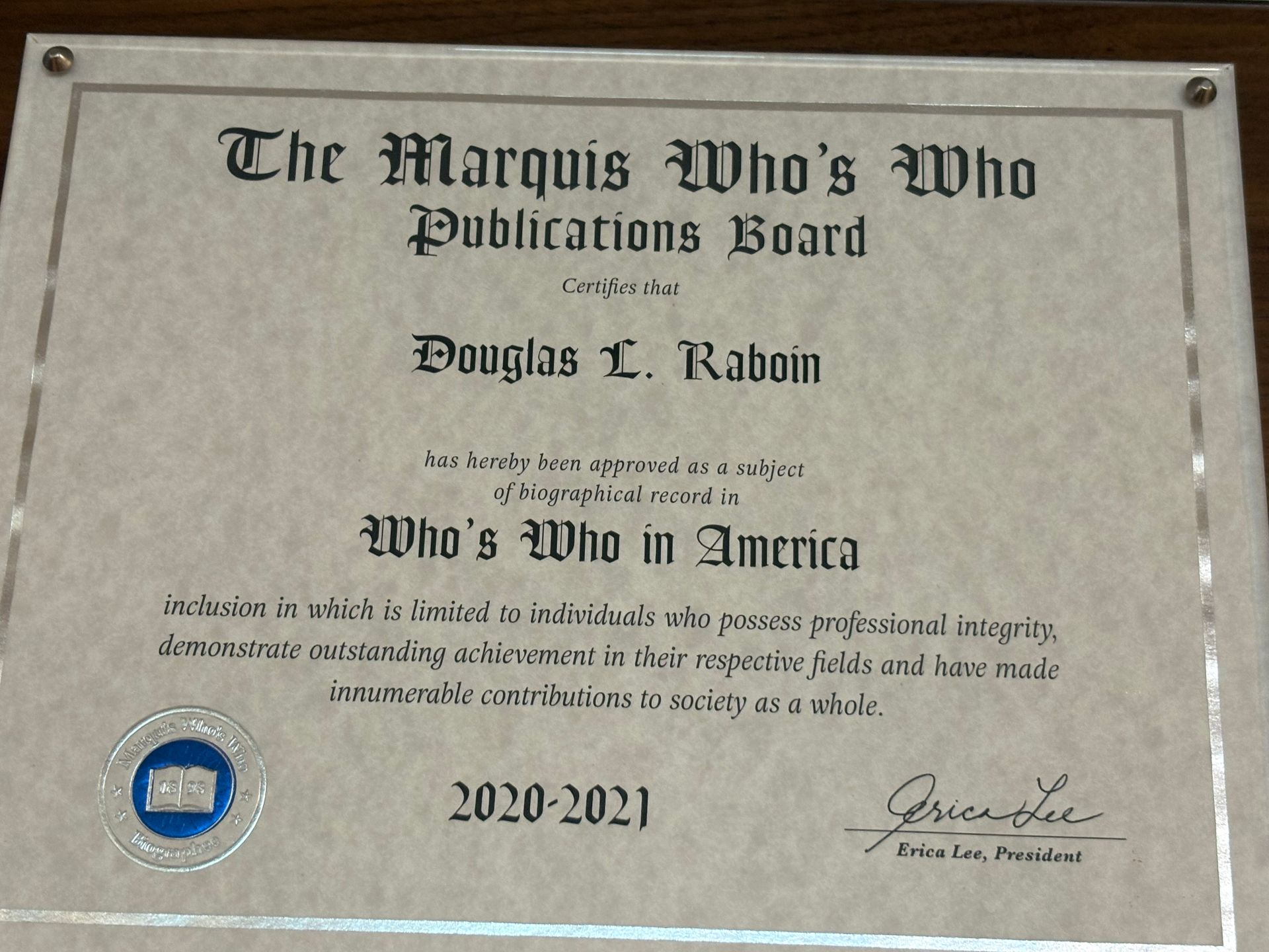Plaque reading “The Marquis Who’s Who Publications Board” with name Douglas T. Rabon and date 2020–2021.