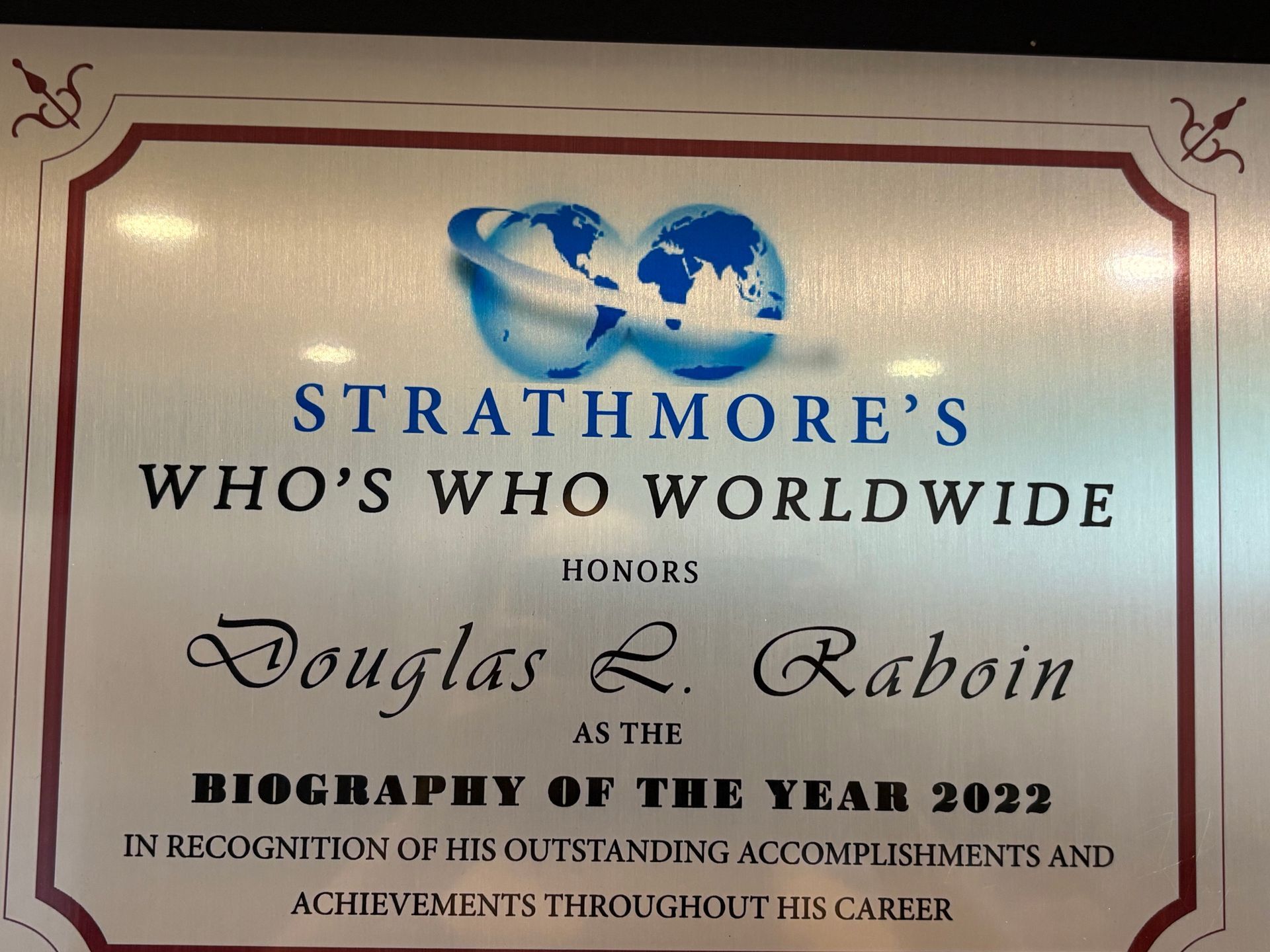 Strathmore's Who's Who Worldwide honor plaque for Douglas A. Raboin, Man of the Year 2022