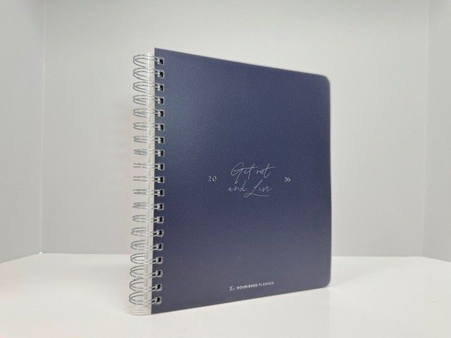 Navy blue spiral-bound planner with 