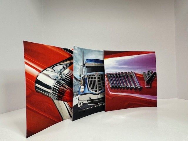 Three curved panels showing car details: red chrome, blue truck, chrome bolts.