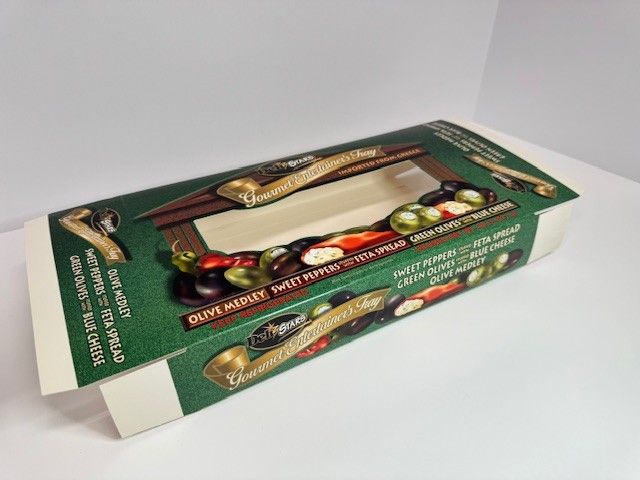 Box of olives with a window, in a green and white package, showing different olives.