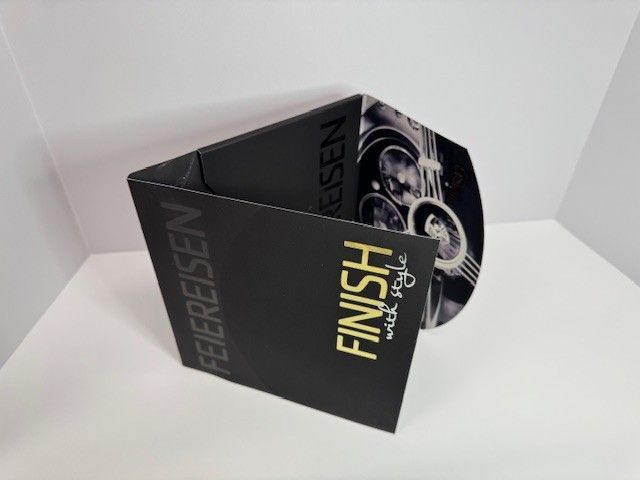 Black and gold brochure with 