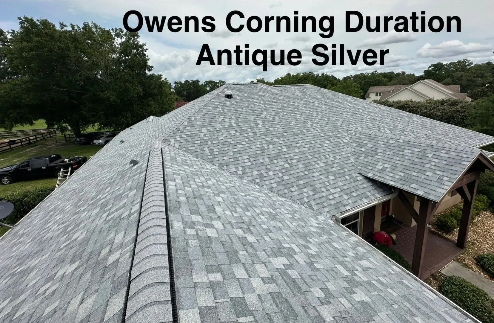 Owens Corning Duration Antique Silver roof shingles on a house viewed from above