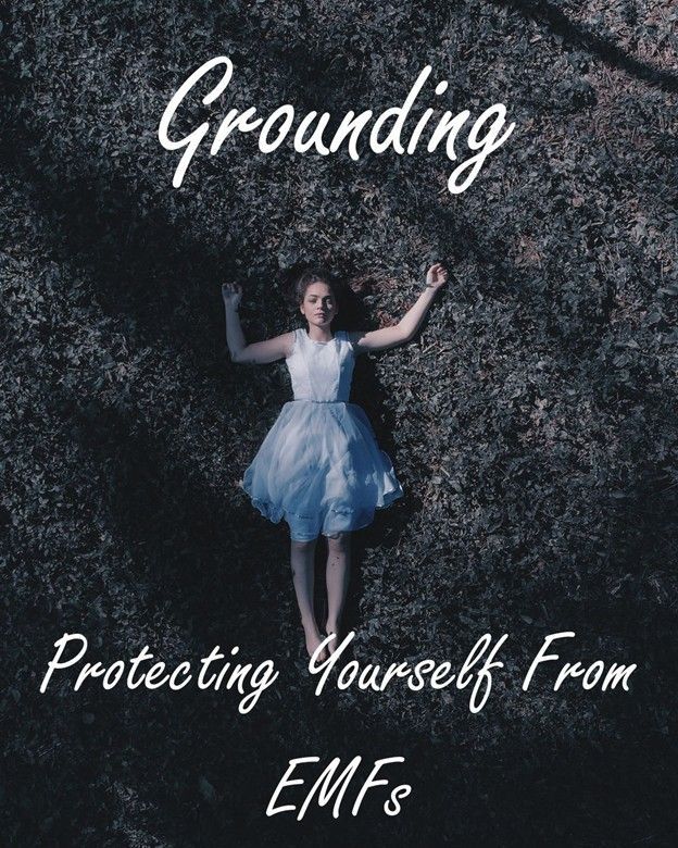 Woman lying on grass, arms outstretched, with text 